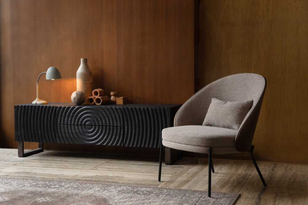 Cole Wooden Media Unit with Lounge Chair and Lampshade in Living Room Setting