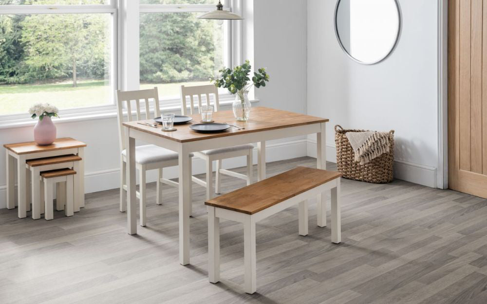 Orr Dining Table 1180mm Ivory and Oak with Wall Mirror and Wooden Chairs in Dining Setting