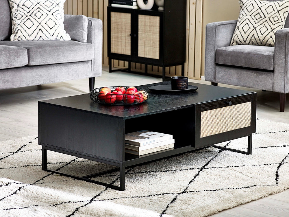 Bari Coffee Table with Armchair and Books in Living Room Setting
