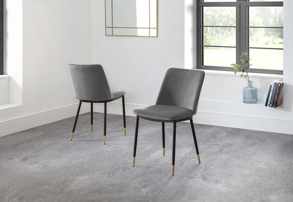 Luna Dining Chair in Grey Finish with Transparent Vase and Books in Breakout Setting