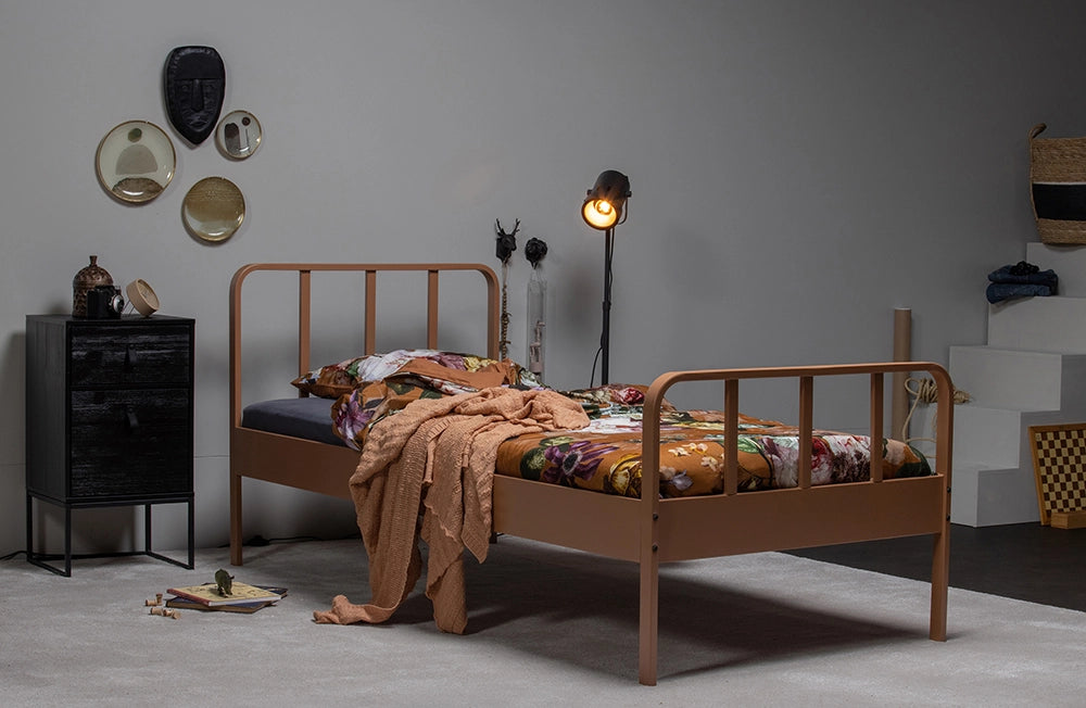 Mews Metal Bed Frame Syrup with Printed Bedsheet and Black Bedside Cabinet in Bedroom Setting